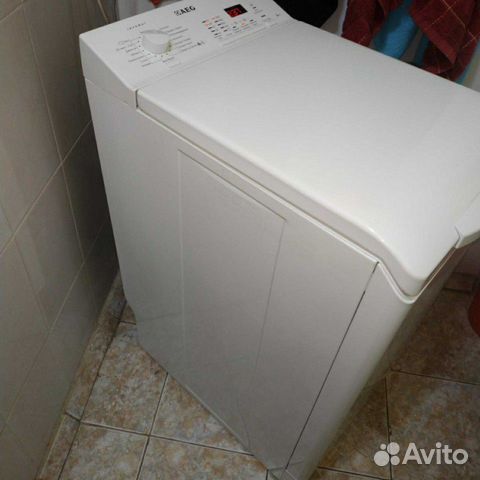 AEG с вертикальной загрузкой 6 кг 1200 об AEG с вертикальной загрузкой 6 кг 1200 об