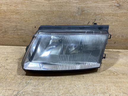 Фара передняя левая VW Passat B5 141655