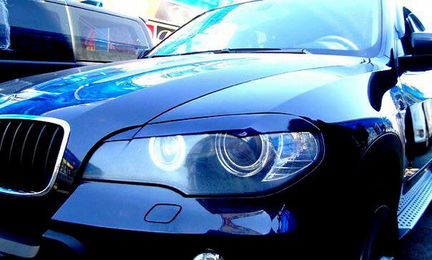 Реснички (накладки) на фары BMW X5E70