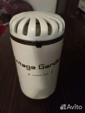 Ароматическая свеча в железном подсвечнике