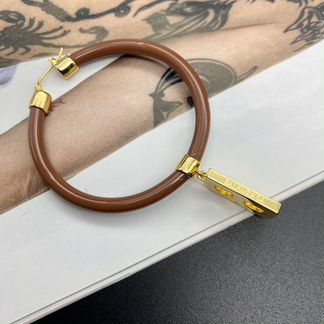 Серьги Balenciaga коричневые