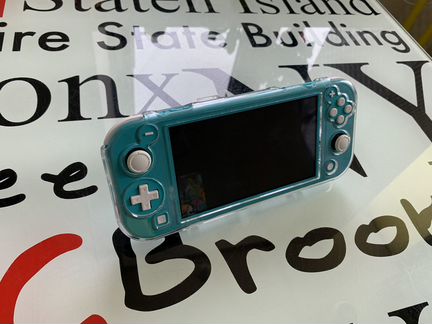Портативная игровая приставка Nintendo Switch+игры