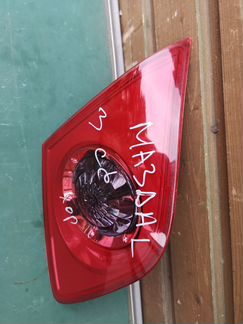 Mazda 3 фонарь в крышку багажника левый