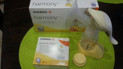 Молокоотсос Medela Harmony+пакеты