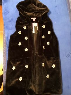 Жилет меховой новый нарядный